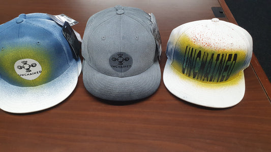 Unchained Confections Snapback flat brim brand hat